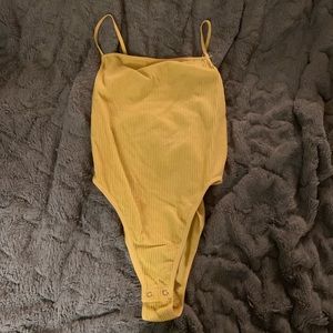 Yellow body suite